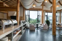 Tengchong Phoenix Terrace · Mengying Wenquan Resort Chinese Inn - bar