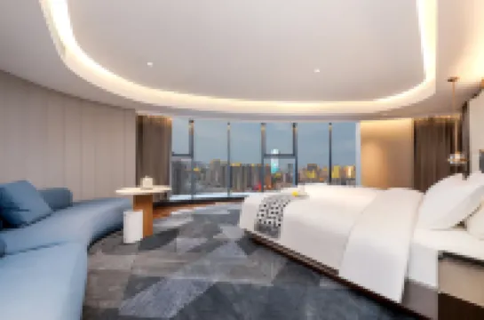 โรงแรมฟลาวเวอร์ (สถานีรถไฟฟ้าความเร็วสูงตะวันออก เจิ้งโจว) โรงแรมใน