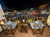 FengHuang Mengqi stilted building river view homestay