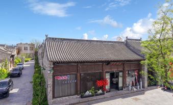 Taohua Island Jianghu Hot Spring Homestay Hotel (Xinzhou Ancient City Branch)