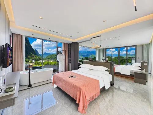 陽朔古榕菲麗利民宿（20元人民幣背景興坪古鎮）