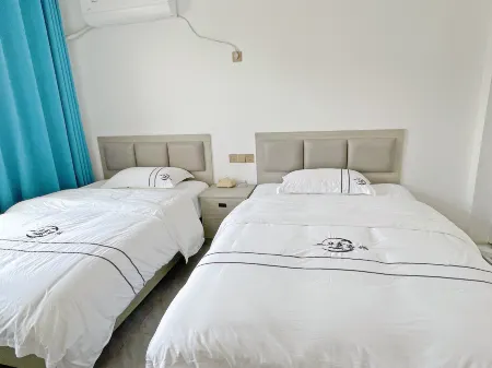 Bamianshan Huaxin Homestay Отели рядом с достопримечательностью «Bamian Mountain»