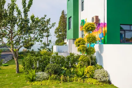 Bujiao Green Homestay (Jinshan North Station Branch) Отели рядом с достопримечательностью «Zhujingzhen»