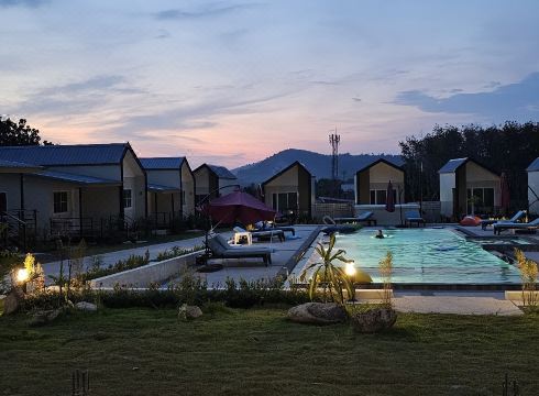 Pool surrounded by tropical garden