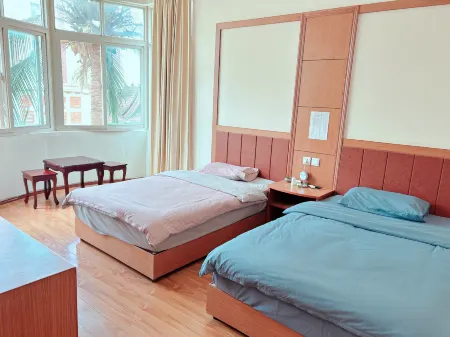 Jinghong Yunxin Hotel Отели рядом с достопримечательностью «Menghanman Tingfota Temple»