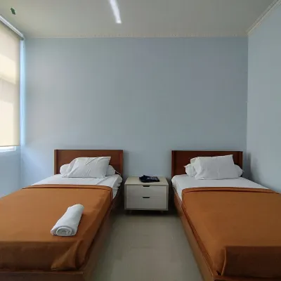 Hotel Sutha Inn Syariah Hotel dekat Indomaret Pal 10 Kota Jambi