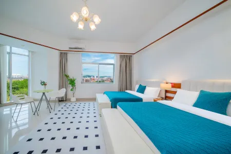 Zhonghui Fashion Hotel Maoming Отели рядом с достопримечательностью «Xiaodongjiang»