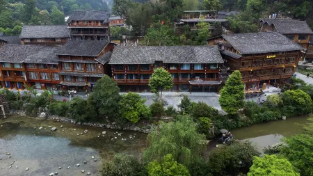 Story Mountain Wind Holiday Bed and Breakfast Отели рядом с достопримечательностью «Zhaoxing Dong Village»