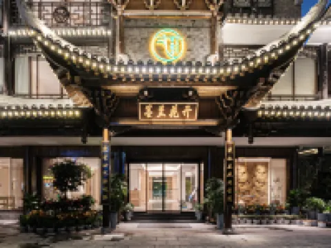 Lotus Cymbidium Sinense Zen Art River View Hotel โรงแรมในเฟิ่งหวง