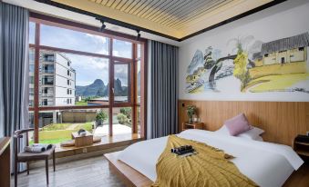 Yangshuo Homecoming Hotel (Jinlongqiao Wharf Bamboo Rafting Branch)