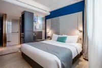 LANOU Hotel (Korla Jindu Square Peacock River Store)