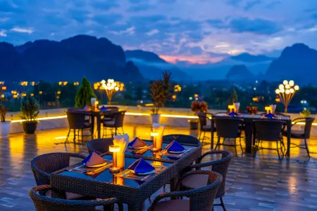 S Vangvieng Boutique Hotel Отели рядом с достопримечательностью «Wat That»