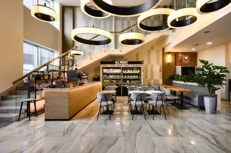 Апарт-отель YES Mitino Отели рядом с достопримечательностью «Самый высокий цилиндрический аквариум в мире»