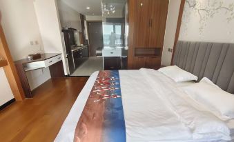 Xinyue Bay Seaview Apartment Hotel (Shibei Bay Dream Water Park Branch)