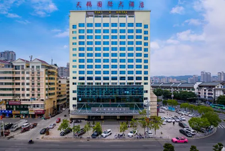 Tian E International Hotel Отели рядом с достопримечательностью «Ninghuawanxing Square»