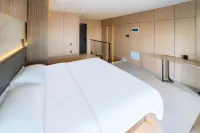 Leman Apartment (Harbin Bingxue Dashijie Shimao Avenue Subway Station Branch)