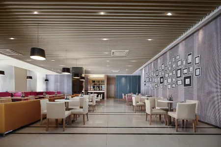 Ningbo Qianwan New Zone Haiyue Huantu NANYUAN INN Hotel (Dazhong Square) Отели рядом с достопримечательностью «Ningbo Engineering College»