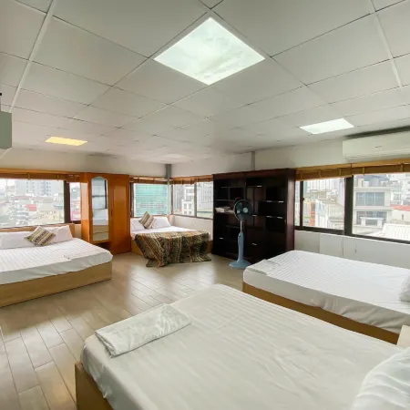 Eco Nest Apartment & Hotel Отели рядом с достопримечательностью «Тюрьма Хоало»