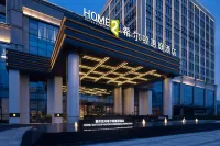 SUITES BY HILTON