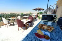 New Gardenia Pyramids view - Rooftop Hotels in Al Haraneyah
