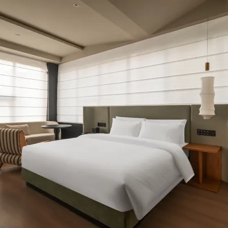 Lingnan Hotel (Guang'an Wuyue Plaza) Отели в г. Гуанан