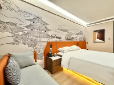Xinxiang Zimu Hotel (Baolong Plaza)