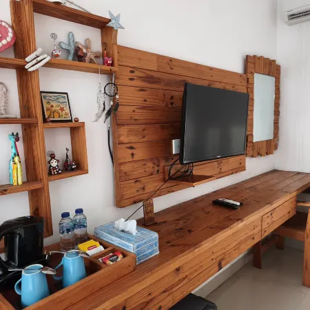 Home 21 Bali Отели рядом с достопримечательностью «Пляж Мертасари»