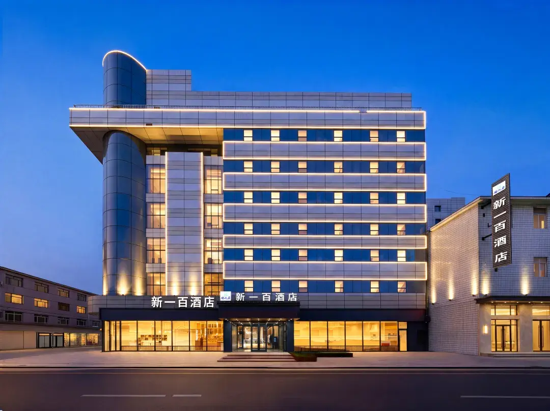 Xinyibai Hotel - 丹東市