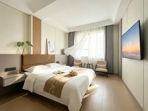 Dunhuang Kaile Peak Modern City Design Homestay (Dunhuang Night Market Branch - Bãi đậu xe