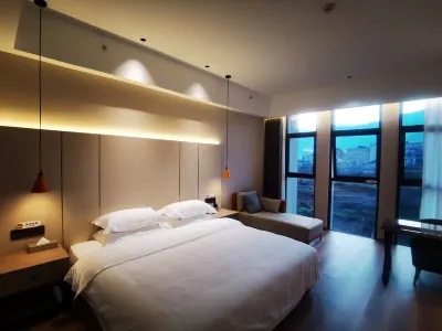 Xinderui Hotel Hôtels à : Dechang