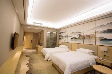 Yixuan Hotel (Hechi Yizhou Sankeshu Market Branch) Отели рядом с достопримечательностью «Hechi University»