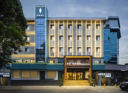 MEHOOD EZZI Hotel (Jiexiu Shi Beitanzhong Road Railway Station) Отели в г. Цзесю