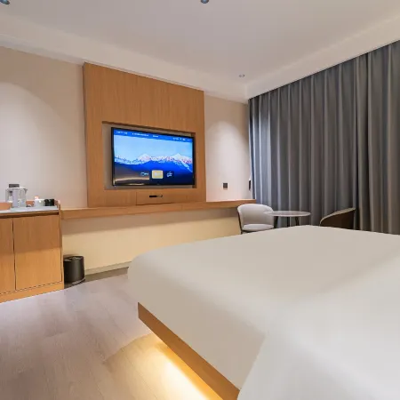 Wenshan Boting Hotel (Sanqi International Trade Market South City Bus Station)