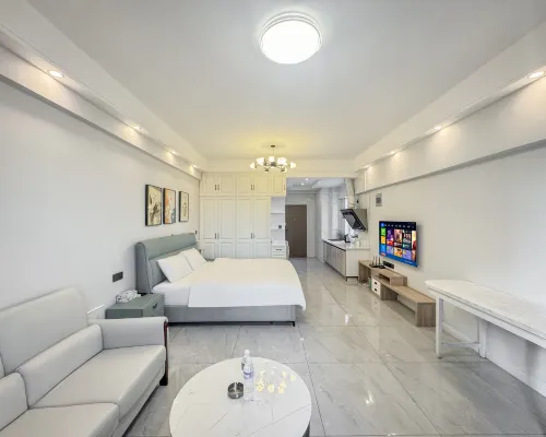 Jinyue Movie Homestay (Longmen High-Speed Railway Station Baolong Plaza) โรงแรมในลั่วหยาง