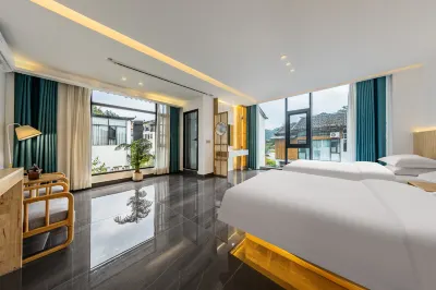 Libo Zhenshang Residence lnn Hotels in Xiaoqikong Scenic Area(East Gate Area)/Daqikong