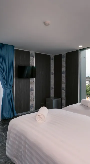 ห้องพักที่มีประตูเชื่อมหากันเตียงคู่