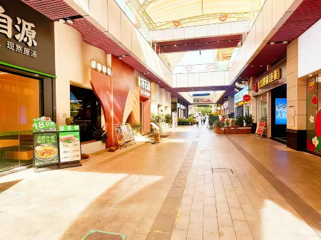 Mi La Boutique Apartment Отели рядом с достопримечательностью «Fuyuan Youye»