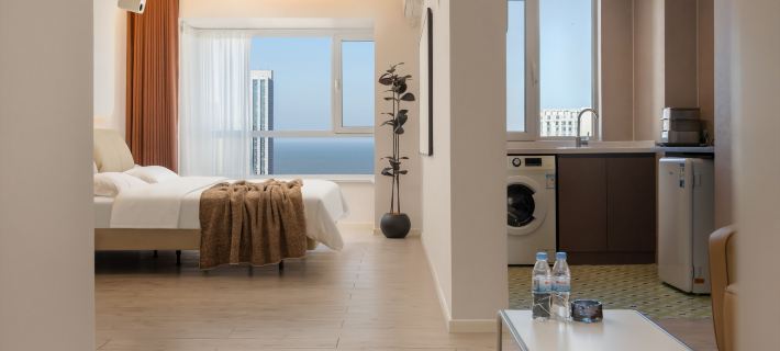 Zhouya Seaview Audio-Visual Vacation Homestay (Huoju 8th Street International Coastal Baths) Отели в г. Вэйхай