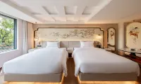Muxi AffordableLuxury Light Luxury Homestay (Kunming Dianchi Lake Scenic Area) - Jacuzzi
