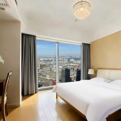 Xiaoxiang Mama Scenic Apartment (Dalian Railway Station Zhongshan Square) 다롄 기차역 주변 호텔