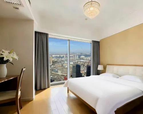 Xiaoxiang Mama Scenic Apartment (Dalian Railway Station Zhongshan Square) Hotel in zona Mori Building