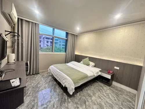 Wanzai Huadu Business Hotel