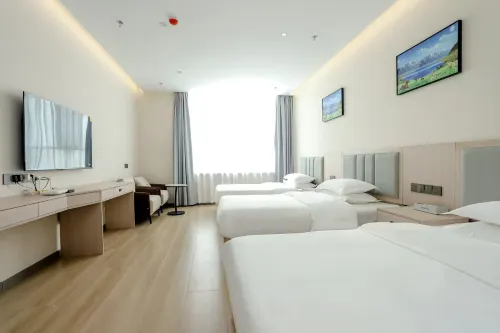 Pengxin Business Hotel (Kuqa Pedestrian Street)