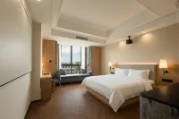 Ma'anshan Licheng Ruixuan Hotel (Cuilin Shuicheng Huafei Road) - พร้อมอาหารเช้า