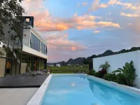 Xingyi Wanfeng Linyi Boutique Inn (Wanfenglin Baguatian Attractions) Hôtels à : Xingyi