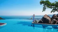 Yalong Bay Earthly Paradise Birds Nest Resort - Strand