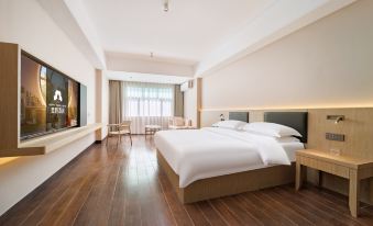 Xingcheng Hotel (Youyi Nanhai City Binlian Night Market)