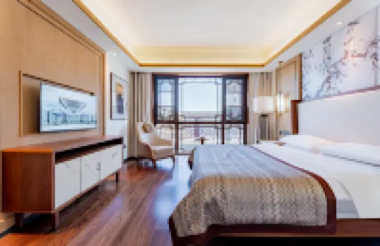 Jinghong Tianqing Hotel (Yijin Holo City Government Shop)