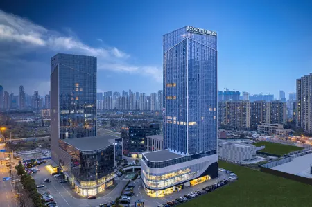 Country Inn & Suites by Radisson(Wuhan High speed Railway Station Happy Valley Branch) Отели рядом с достопримечательностью «The Luoyan Island»