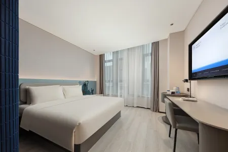 Wuxi Taihu  New City Financial Street Light Hotel Отели рядом с достопримечательностью «Wuxi Changguangxi National Wetland Park»